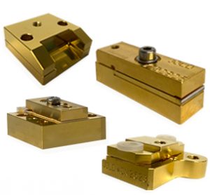 various brass or gold colored laser diode bar/array housings