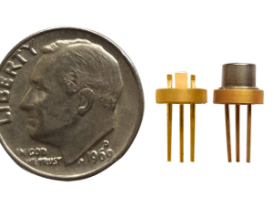 brass colored mini to-56 laser diode package, circular with 3 electrical pins and silver cap with optical, one with no cap, US Dime for size